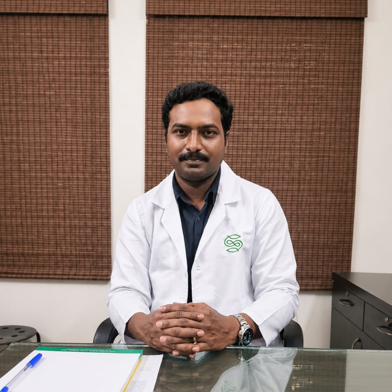 Dr. Abhijith G